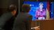 Angela Merkel auf TV-Bildschirm während Neujahrsansprache 2015 (Foto: Reuters) Angela Merkel auf TV-Bildschirm während Neujahrsansprache 2015 (Foto: Reuters)