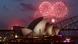Fireworks light up the Sydney Opera House during an early light show before the new year December 31, 2014. More than 10,000 aerial fireworks, 25,000 shooting comets and 100,000 pyrotechnic effects are expected to be used during the annual Sydney Harbour New Year's Eve show, with an estimated 1.6 million people watching from along the harbour foreshore, local media reported. REUTERS/Jason Reed Fireworks light up the Sydney Opera House during an early light show before the new year December 31, 2014. More than 10,000 aerial fireworks, 25,000 shooting comets and 100,000 pyrotechnic effects are expected to be used during the annual Sydney Harbour New Year's Eve show, with an estimated 1.6 million people watching from along the harbour foreshore, local media reported. REUTERS/Jason Reed