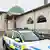 A police car is parked in front of a mosque in Uppsala, Sweden January 1, 2015. A Molotov cocktail was thrown at the mosque early Thursday. No one was hurt and the fire burnt itself out, local media reported. REUTERS/Pontus Lundahl/TT News Agency