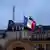 französische Flagge auf Halbmast Foto: "Reuters/P. Wojazer