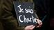 A man holds a sign reading "Je suis Charlie" - I am Charlie at a march for press freedom A man holds a sign reading "Je suis Charlie" - I am Charlie at a march for press freedom