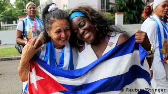 Kuba Freigelassene Dissidenten mit Fahne 11.01.2015