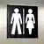 Schild einer Herren- und Damentoilette