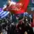 Стороники партии СИРИЗА празднуют ее победу в Афинах 25 января 2015 года