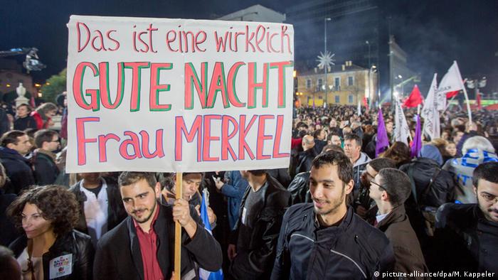 Syriza Unterstützer Feier 25.01.2015 Athen Transparent Merkel