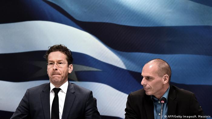 Jeroen Dijsselbloem and Yanis Varoufakis ARIS MESSINIS/AFP/Getty Images