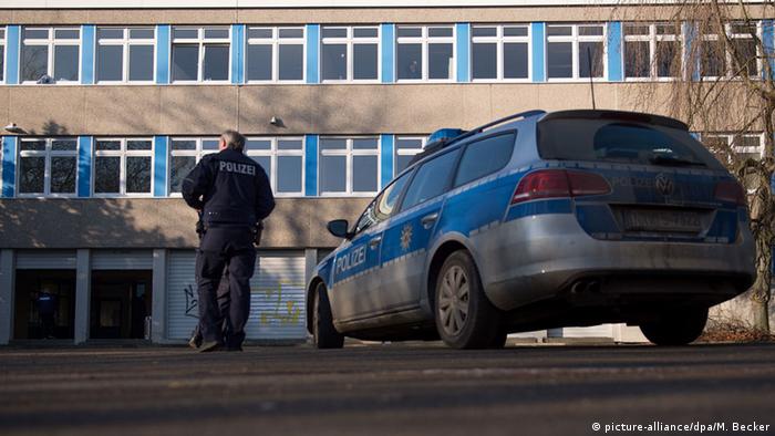 A police car outside a Dortmund refugee home