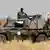 South Sudanese troops in armored vehicle Samir Bol / Anadolu Agency