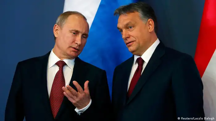 Putin gestures to Orban before a press conference in Budapest (Reuters/Laszlo Balogh)