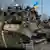Ukrainian soldiers, tanks