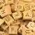 Scrabble tokens. (Photo: picture alliance/ blickwinkel/ McPHOTO)