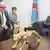 Bundesaußenminister Frank-Walter Steinmeier mit dem kongolesischen Präsidenten Joseph Kabila und Übersetzerin (Foto: picture-alliance/dpa/M.)Kappeler