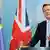 Cameron mit britischer und EU-Flagge Foto: picture-alliance/dpa