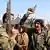 Иракские военные во время подготовки к наступлению на Тикрит