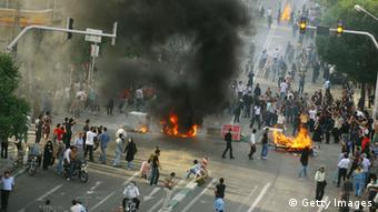 Thousands of Iranians clash with police in June 2009