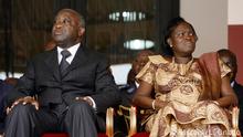 01.04.2009 * Then Ivory Coast's President Laurent Gbagbo and his wife Simone Gbagbo attend a memorial ceremony at Felix Houphouet Boigny stadium in Abidjan in this April 1, 2009 file photo. A court in Ivory Coast on March 10, 2015 found former first lady Simone Gbagbo guilty of charges related to her role in a 2011 post-election crisis in which around 3,000 people were killed, sentencing her to 20 years in prison, her lawyer said. REUTERS/Luc Gnago/Files (IVORY COAST - Tags: POLITICS PROFILE CRIME LAW)