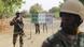 Nigerien soldiers walk past a customs signpost in Duji, Nigeria, March 25, 2015 (Photo: REUTERS/Joe Penney) Nigerien soldiers walk past a customs signpost in Duji, Nigeria, March 25, 2015 (Photo: REUTERS/Joe Penney)