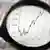 Magnifying glass symbolizing a close look at numbers