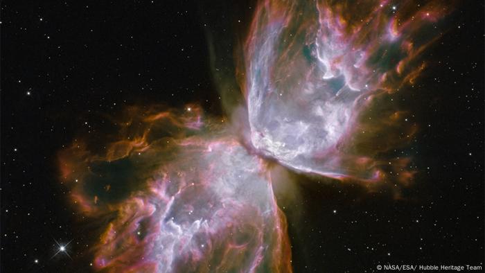 Planetary Nebula. What resemble dainty butterfly wings are actually roiling cauldrons of gas heated to more than 36,000 degrees Fahrenheit. The gas is tearing across space at more than 600,000 miles an hour—fast enough to travel from Earth to the Moon in 24 minutes!