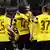 Dortmund players celebrate their win over Hoffenheim