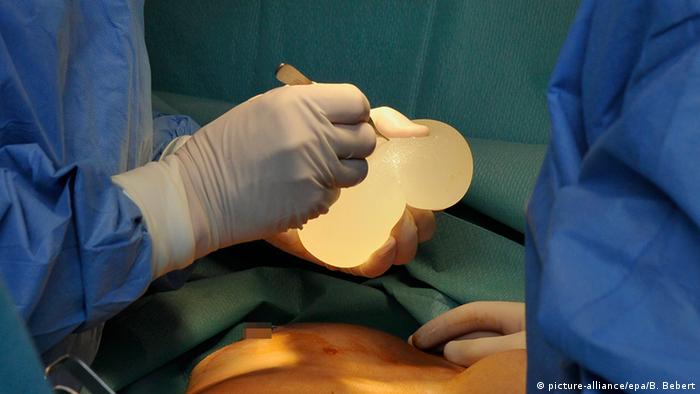French doctors perform a breast augmentation operation