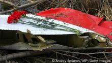 Flowers lay on the wreckage of crashed Polish government Tupolev Tu-154 aircraft near Smolensk airport on April 11, 2010. The bodies of Polish president Lech Kaczynski and his wife Maria will arrive in Poland at 1200 GMT Sunday from Russia where they were among 96 killed in an air crash a day earlier, Polish radio reported. They were killed when a Russian-built jet came down in thick fog near Smolensk on Saturday on the way to a memorial service for 22,000 Poles massacred by Soviet troops in World War II. AFP PHOTO / ANDREY SMIRNOV (Photo credit should read ANDREY SMIRNOV/AFP/Getty Images)