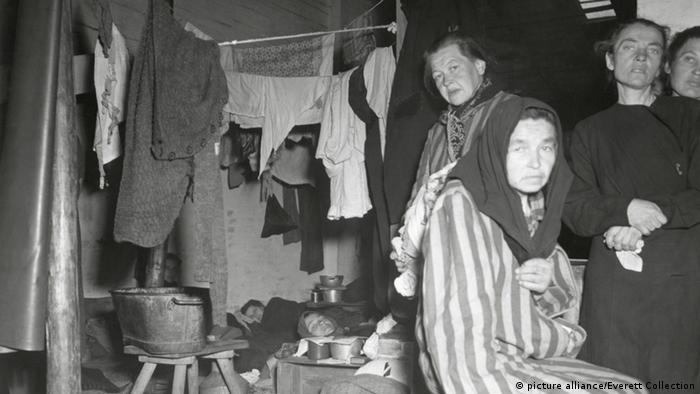Women who survived the Holocaust living in makeshift conditions in 1945 in the displaced persons' camp on the site of the former Bergen-Belsen concentration camp