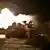 Израелска самоходна артилерийска установка води огън по палестински позиции в Газа на 28-ми декември 2005 г.