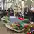 Бывшие узники возлагают цветы в Заксенхаузене