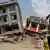 Schwer beschädigte Häuser in Kathmandu (Foto: dpa)