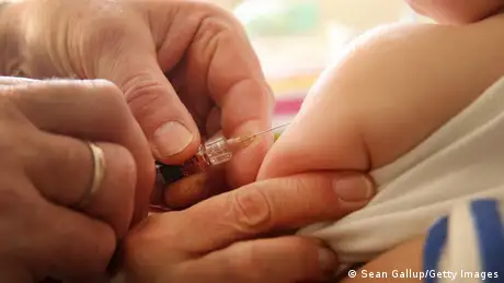 A child being vaccinated (Sean Gallup/Getty Images)