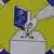 A hand puts a voting paper in the ballot box in this picture by the National Electoral Commission