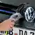 A man powers up an electric Volkswagen GTI
