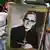 Devotees hold a portrait of late Catholic Archbishop of El Salvador Oscar Romero