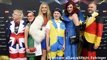epa04763906 Guests wearing fancy costumes pose before the start of the Grand Final of the 60th annual Eurovision Song Contest (ESC) at the Wiener Stadthalle in Vienna, Austria, 23 May 2015. There are 27 finalists from as many countries competing in the grand final. EPA/HELMUT FOHRINGER - +++(c) dpa - Bildfunk+++