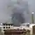 Smoke rising from buildings in Sanaa following Saudi-led air strike. EPA/YAHYA ARHAB +++(c) dpa