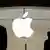 Apple logo with silhouettes