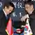 El ministro de Comercio surcoreano, Yoon Sang-Jick (R) y su homólogo chino, Gao Hucheng. (Archivo).