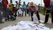 Pile of papers on the ground amid protests. XINHUA /LANDOV Pile of papers on the ground amid protests. XINHUA /LANDOV