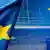 A picture of the European Union's blue flag with yellow stars