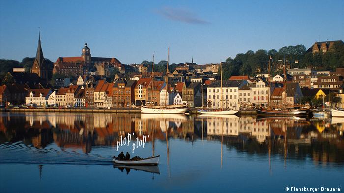 Buildings of the town of Flensburg along the water.