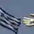 Рука на фоне греческого флага
