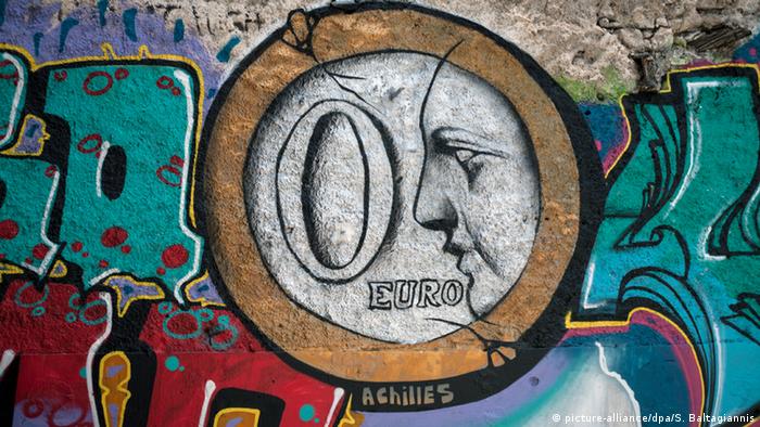 Граффити на стене: монета в 0 евро