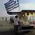 Little booth with a Greek flag on the beach. (Photo: REUTERS/ Alexandros Avramidis)