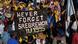 Bosnian protesters hold a banner reading 'never forget Srebrenica' during the Srebrenica Peace March near the city center of Srebrenica on July 10, 2015 (Photo: ELVIS BARUKCIC/AFP/Getty Images) Bosnian protesters hold a banner reading 'never forget Srebrenica' during the Srebrenica Peace March near the city center of Srebrenica on July 10, 2015 (Photo: ELVIS BARUKCIC/AFP/Getty Images)