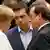 Канцлерка ФРН Анґела Меркель (л), прем'єр-міністр Греції Алексіс Ципрас (ц) та президент Франції Франсуа Олланд