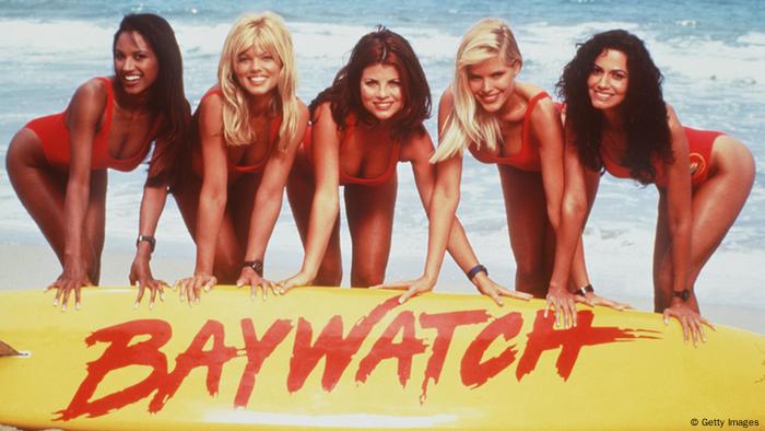 Baywatch women in red suits (Photo By Getty Images)