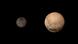Zwergplanet Pluto und sein Mond Charon (Foto: picture-alliance/dpa/NASA/JHUAPL) Zwergplanet Pluto und sein Mond Charon (Foto: picture-alliance/dpa/NASA/JHUAPL)