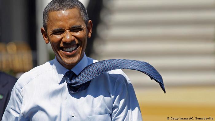Barack Obama with his tie blowing in the wind