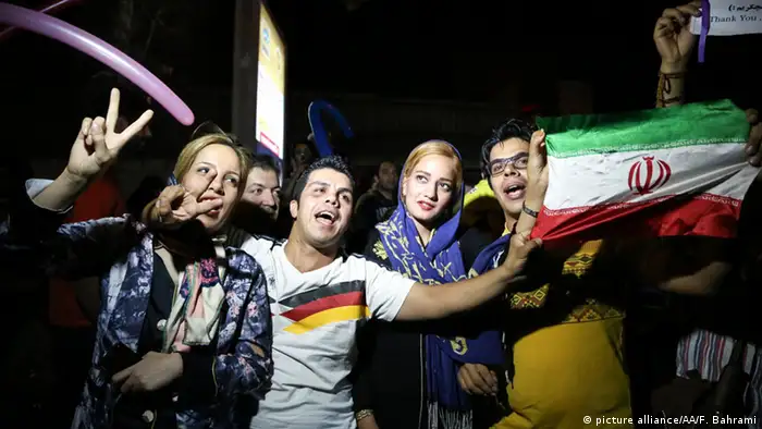 Iranians celebrate the deal